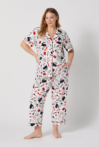 A lady wearing plus size Devil Wears Prada Short Sleeve Classic Stretch Jersey Cropped Pj 