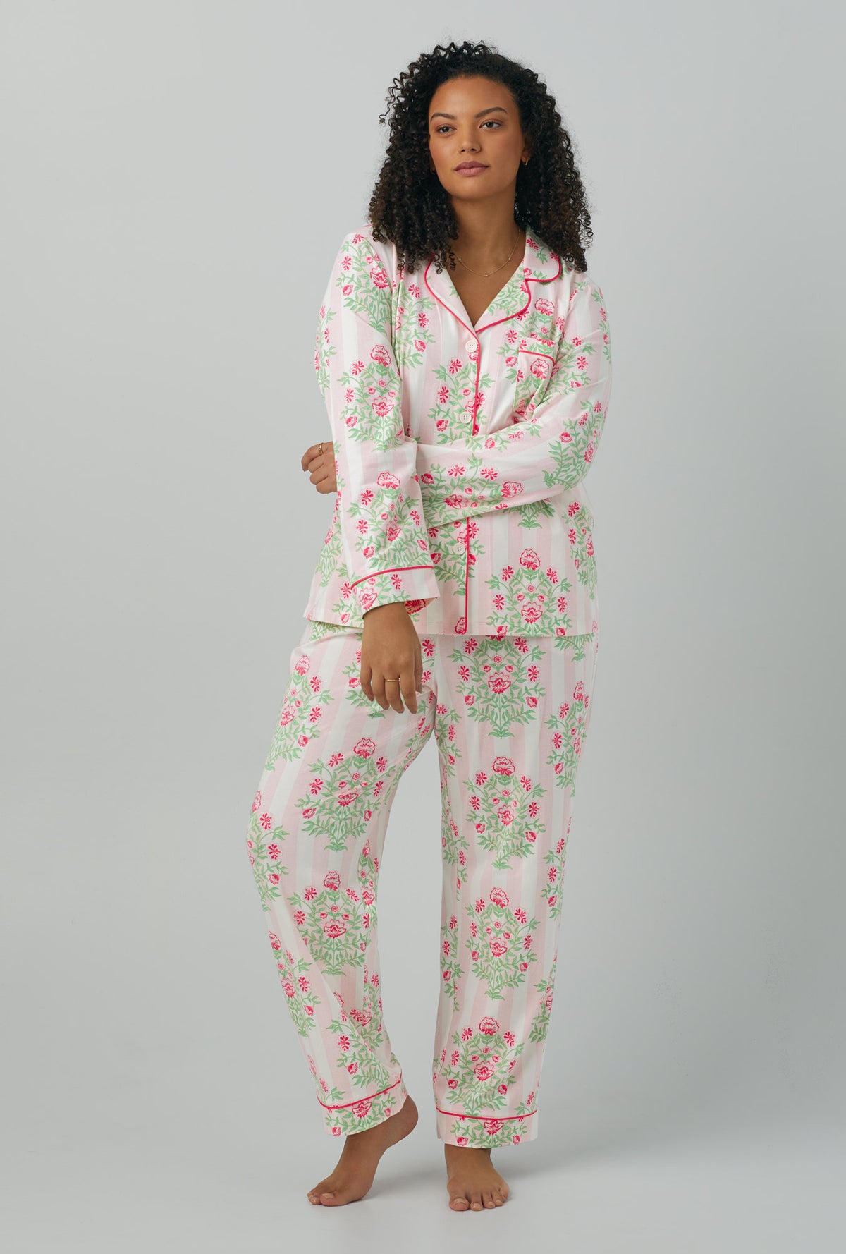 A lady wearing Long Sleeve Classic Stretch Jersey PJ Set with Estate Bouquet prints