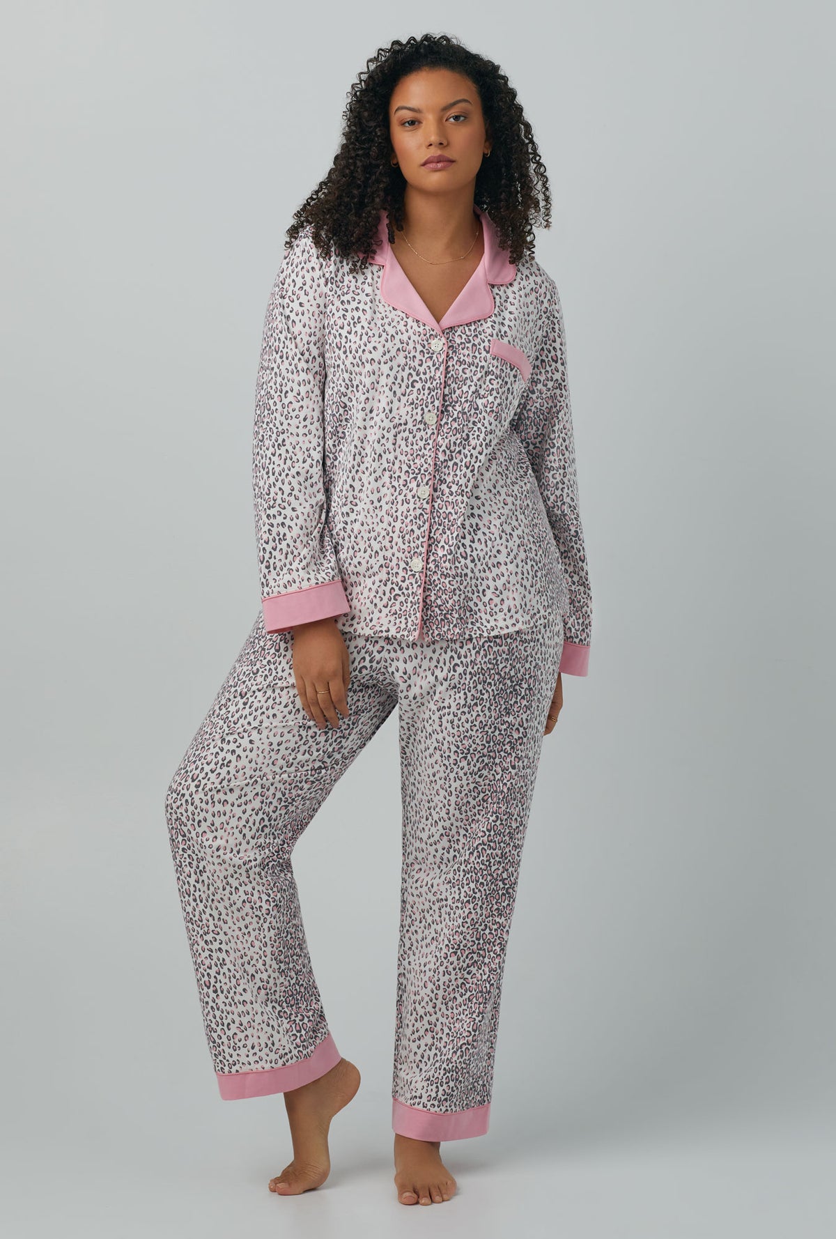 A lady wearing Long Sleeve Classic Stretch Jersey PJ Set with spa kitten print