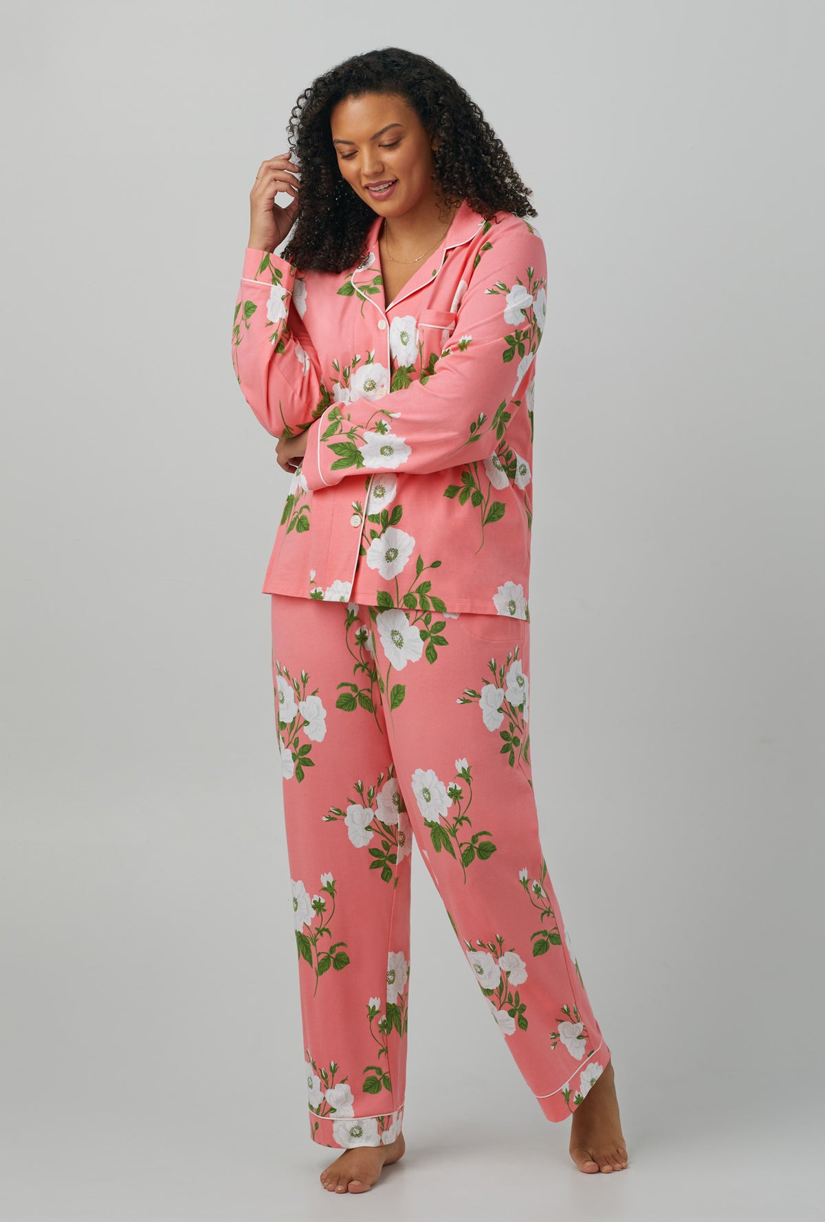 A lady wearing plus size  red Long Sleeve Classic Stretch Jersey PJ Set with White Poppy print