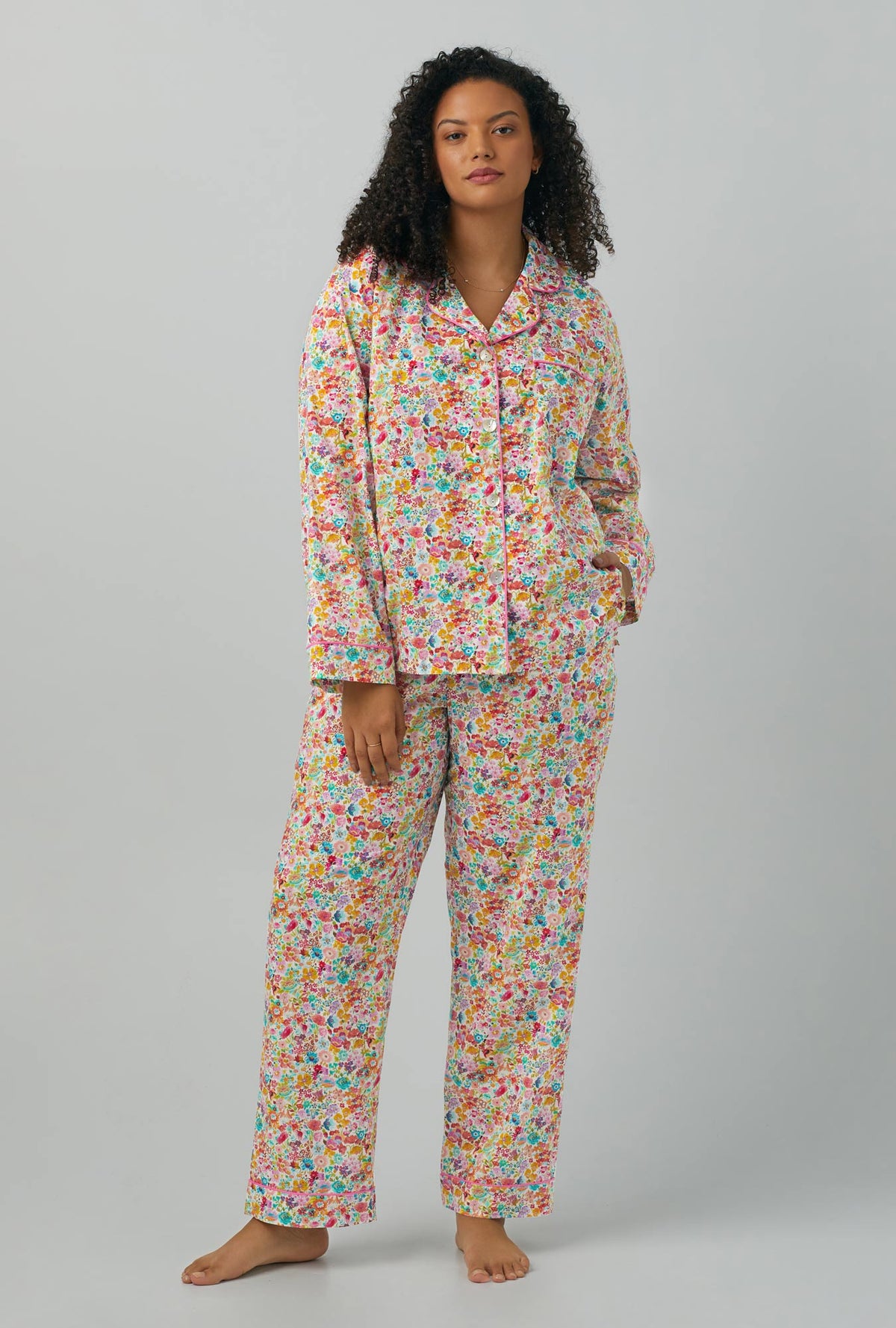 A lady wearing multi color plus size Long Sleeve Classic Woven Cotton PJ Set with Classic Meadow print