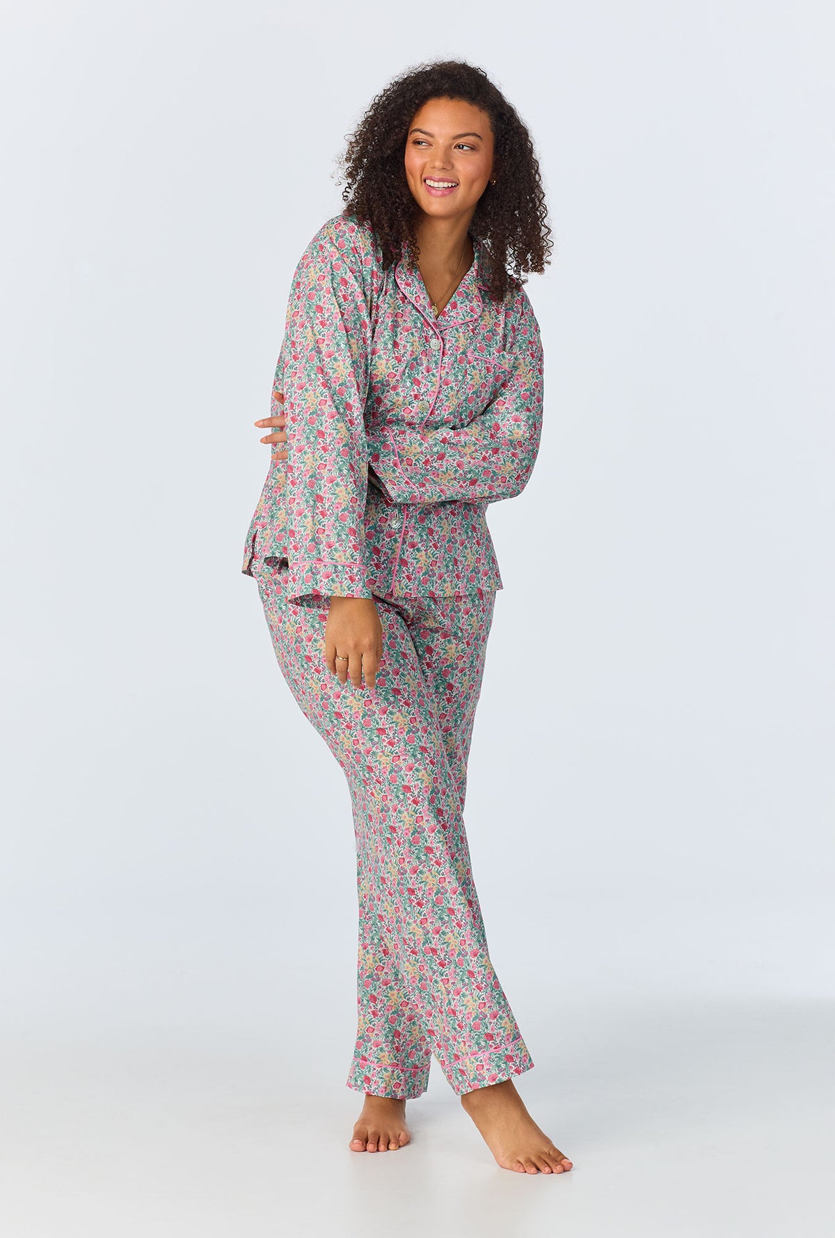 A lady wearing Florence May Long Sleeve Classic Woven Cotton Tana Lawn Long PJ Set Made with Liberty Fabrics