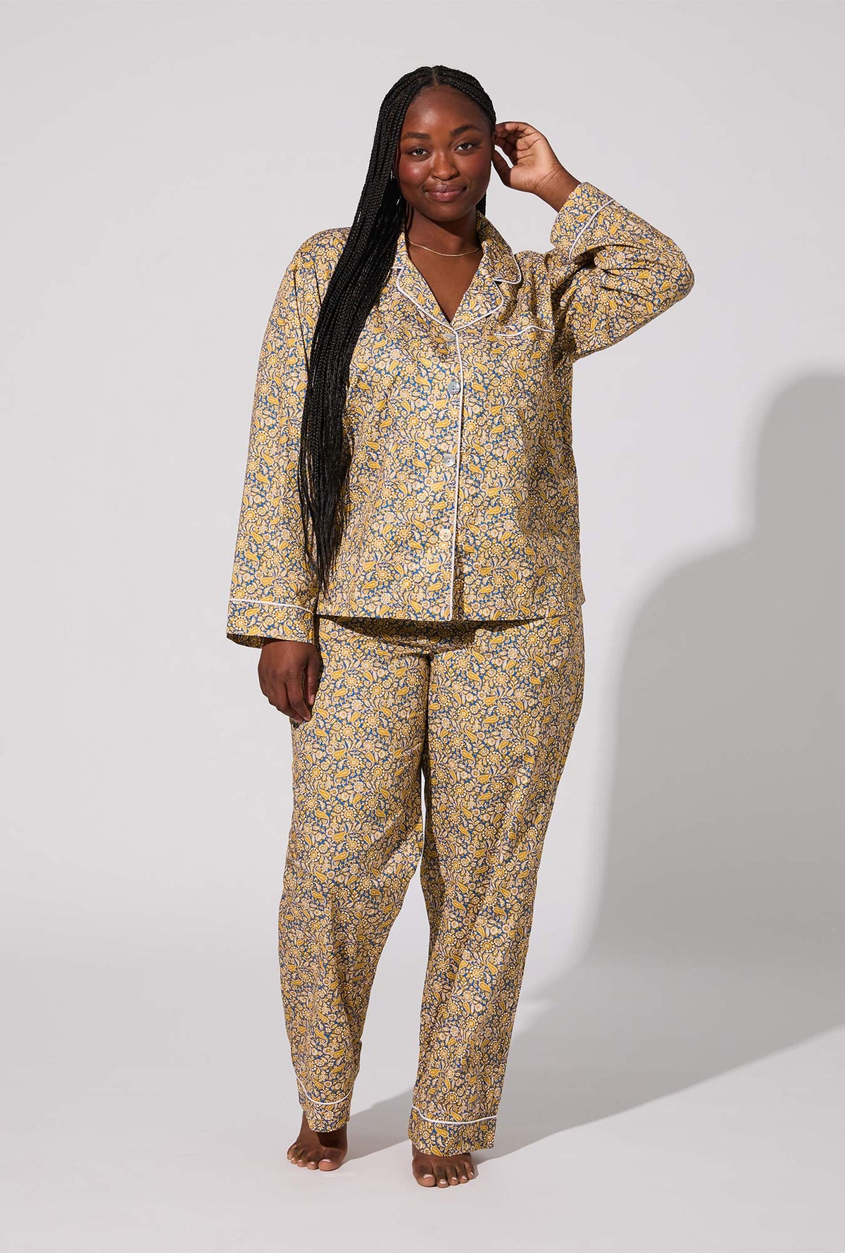 A lady wearing Theodore Manor Long Sleeve Classic Woven Tana Lawn® PJ Set Made With Liberty Fabric