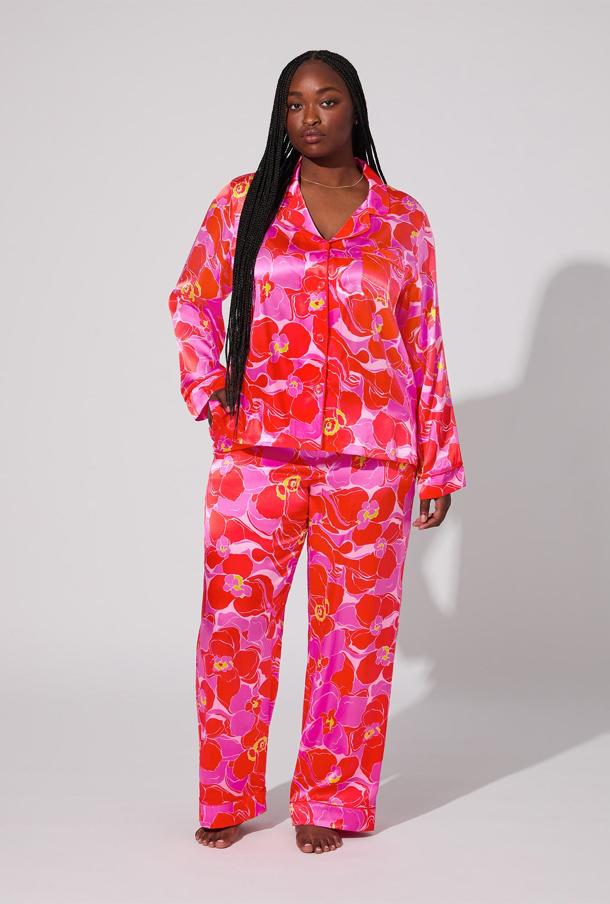 A lady wearing BedHead X Trina Turk Winter Orchids Long Sleeve Classic Washable Silk plus PJ Set