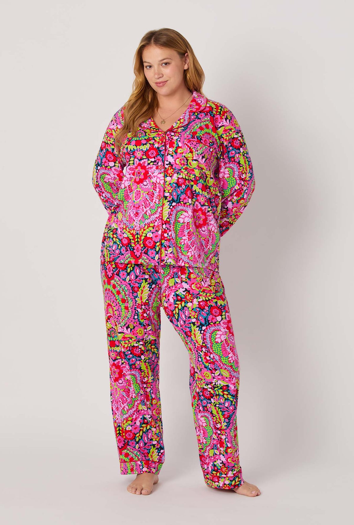A lady wearing BedHead x Trina Turk Las Flores Long Sleeve Classic Stretch Jersey Pj Set