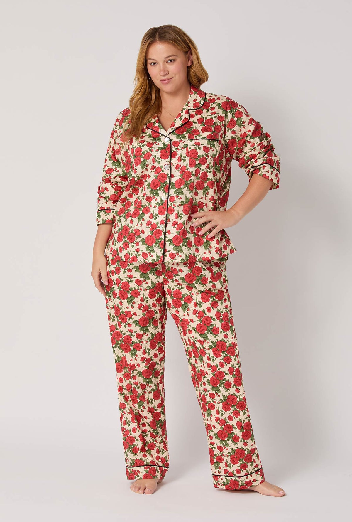 A lady wearing Carline Rose Long Sleeve Classic Woven Tana Lawn® Plus Pj Set Made With Liberty Fabric