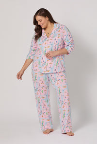 A lady wearing plus size New York, New York Long Sleeve Classic Stretch Jersey Pj Set