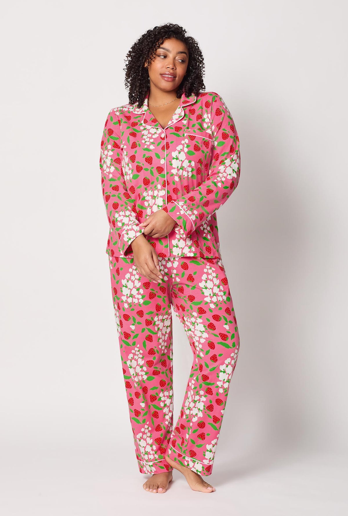 A lady wearing plus size Spring Berry Long Sleeve Classic Stretch Jersey Pj Set