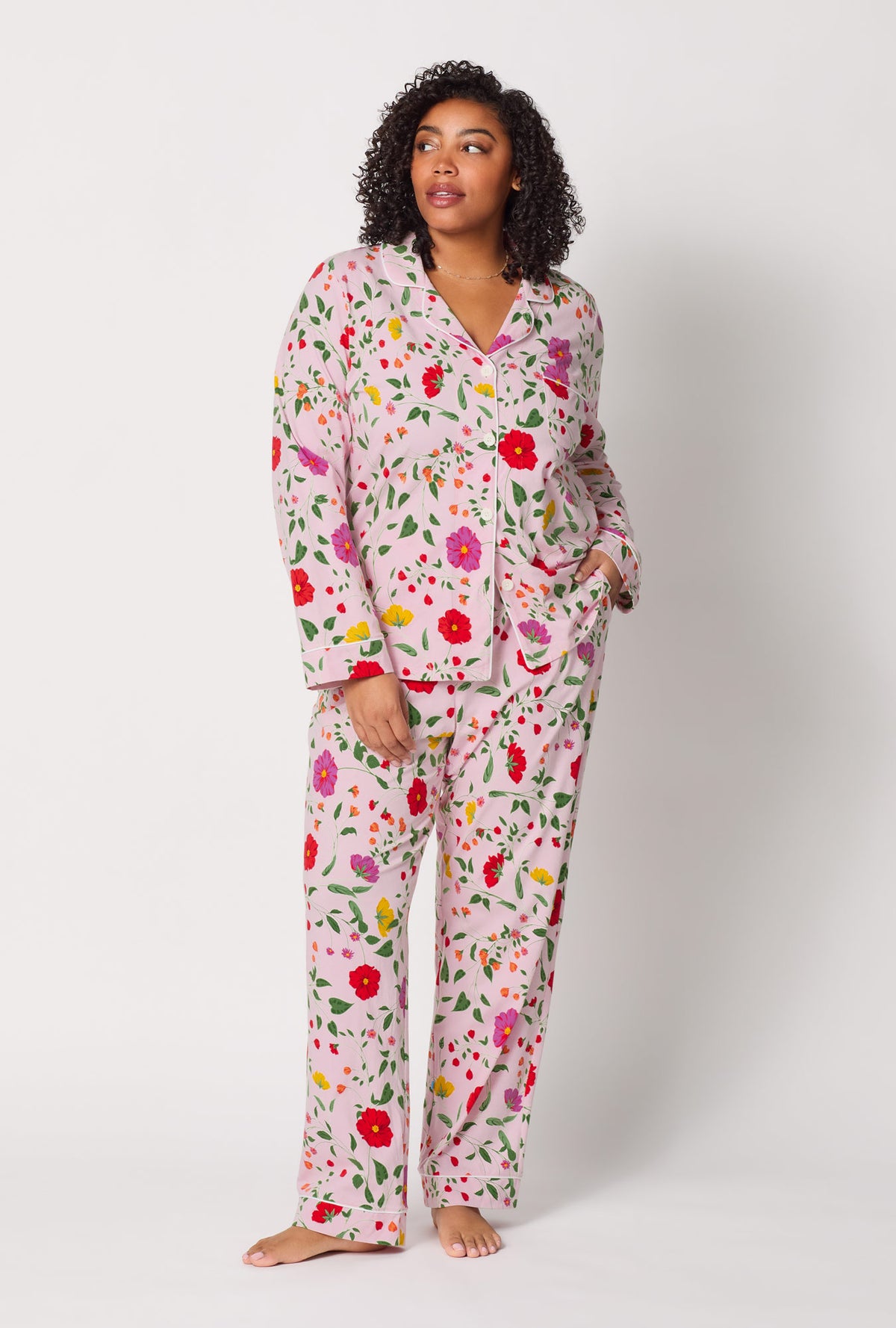 A lady wearing plus size Sunlit Floral Long Sleeve Classic Stretch Jersey Pj Set