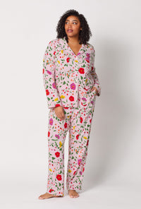 A lady wearing plus size Sunlit Floral Long Sleeve Classic Stretch Jersey Pj Set