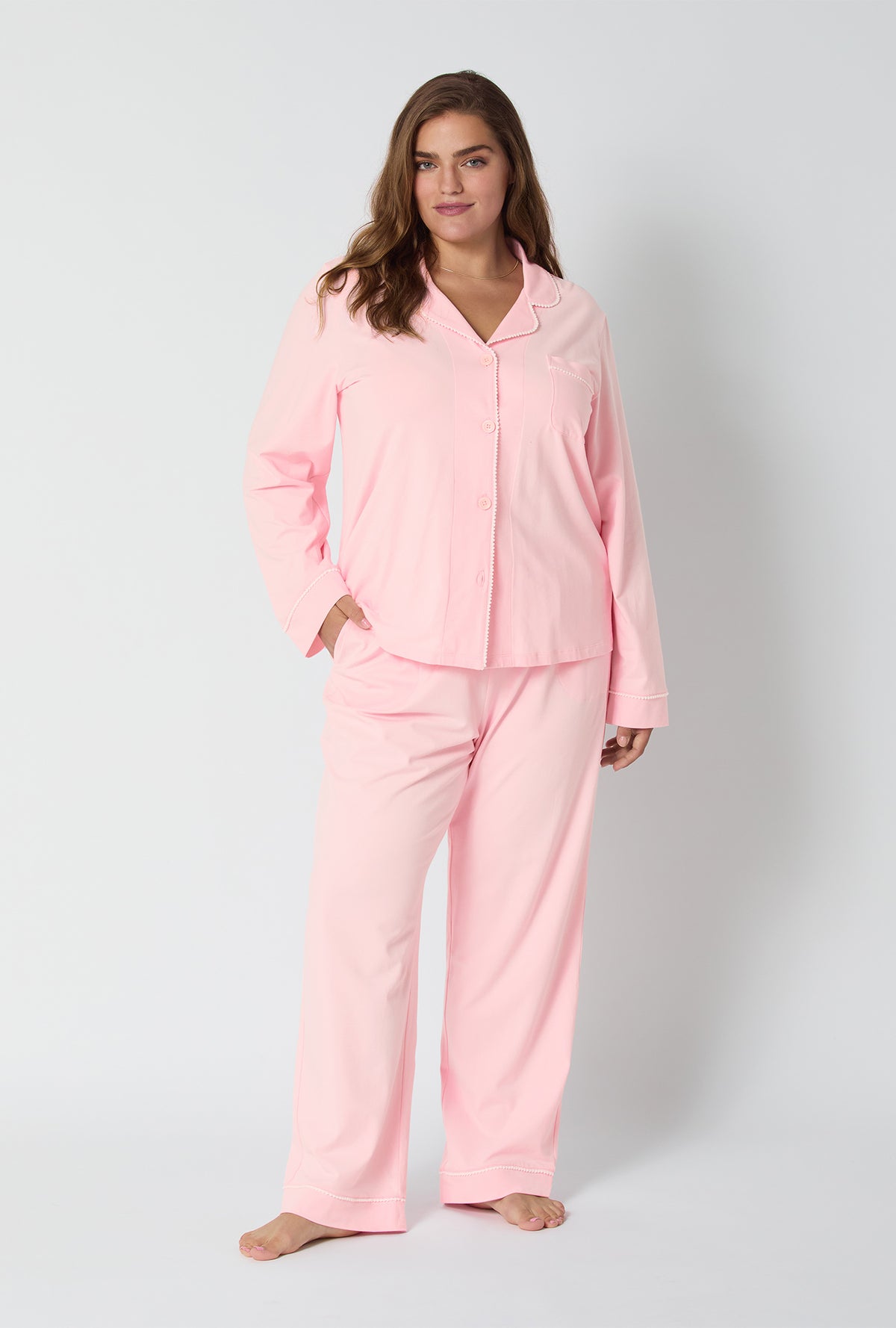 A lady wearing Pink Powder Long Sleeve Classic Stretch Jersey Pj Set