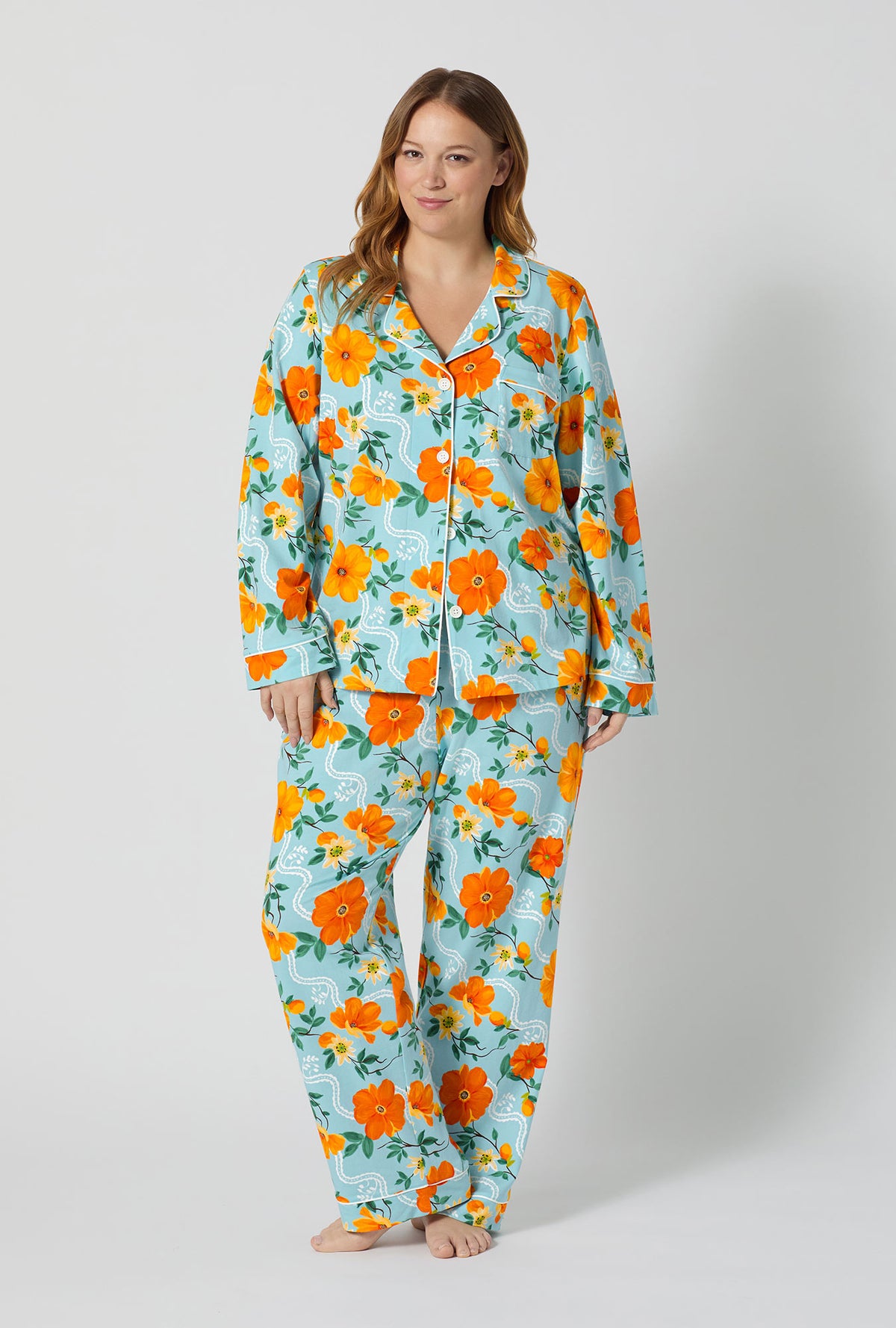 A lady wearing plus size Golden Breeze Long Sleeve Classic Stretch Jersey Pj Set