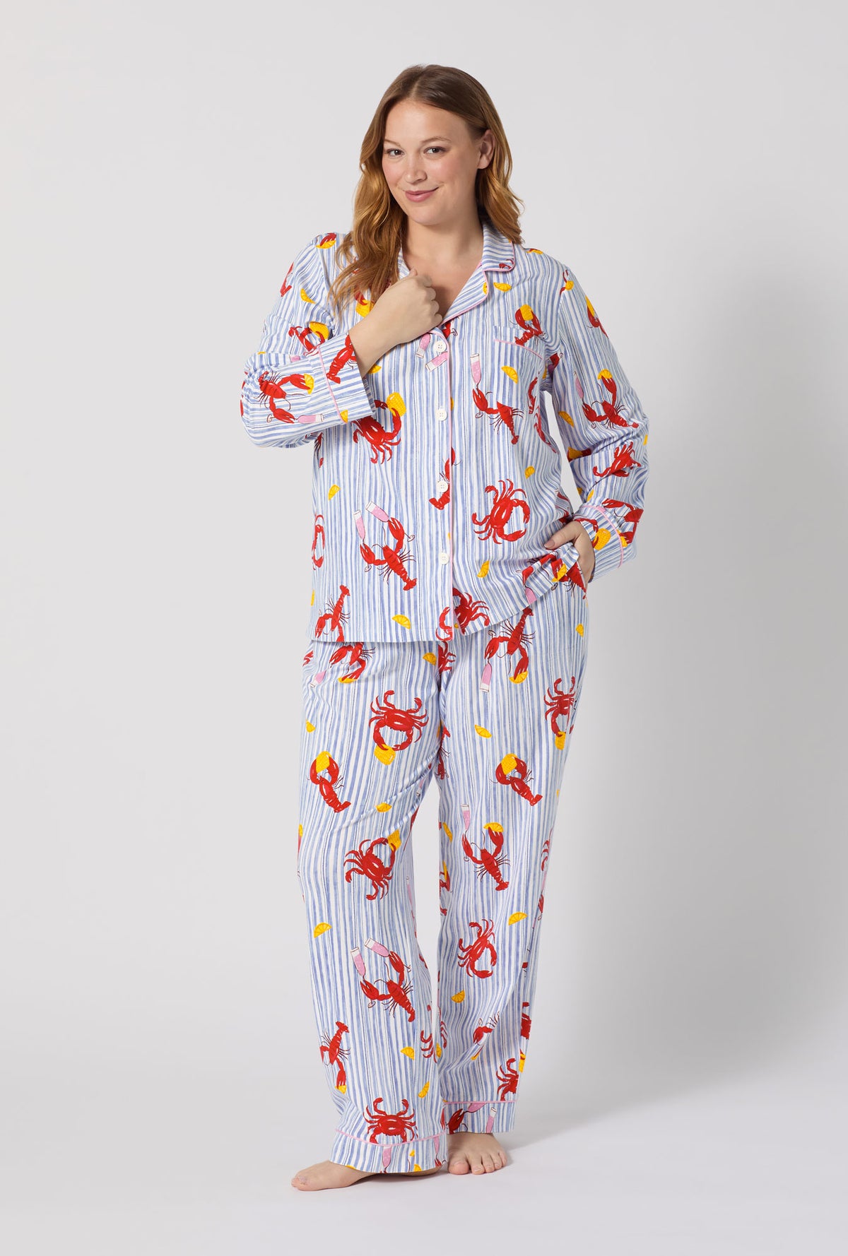 A lady wearing plus size Coastal Feast Long Sleeve Classic Stretch Jersey Pj Set 