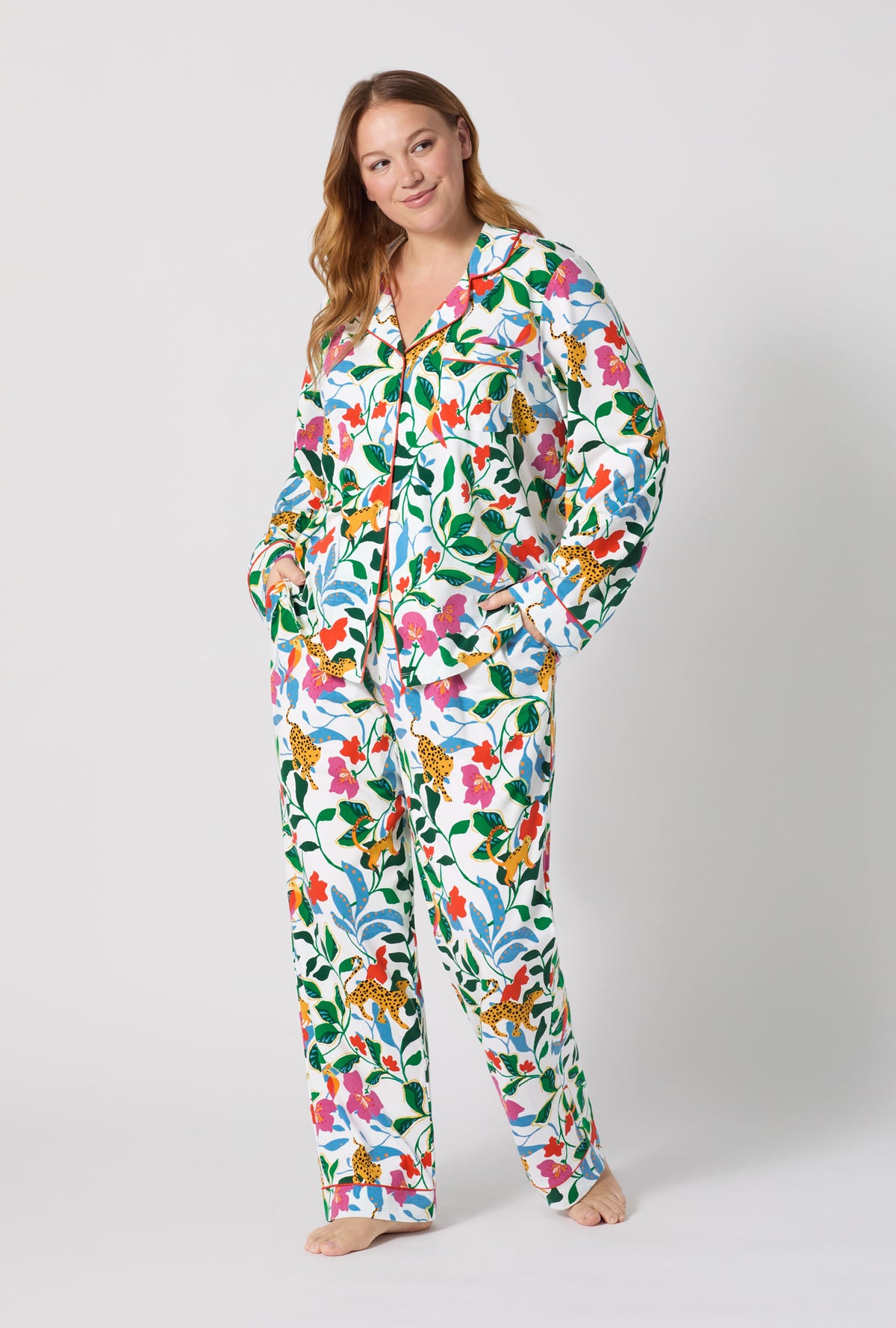 A Lady Wearing Plus Size Jungle Serenade Long Sleeve Classic Stretch Jersey Pj Set posing with a front view look