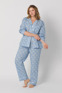 A lady wearing plus size Blue Long Sleeve Classic Woven Tana Lawn® Pj Set Made With Liberty Fabric front view