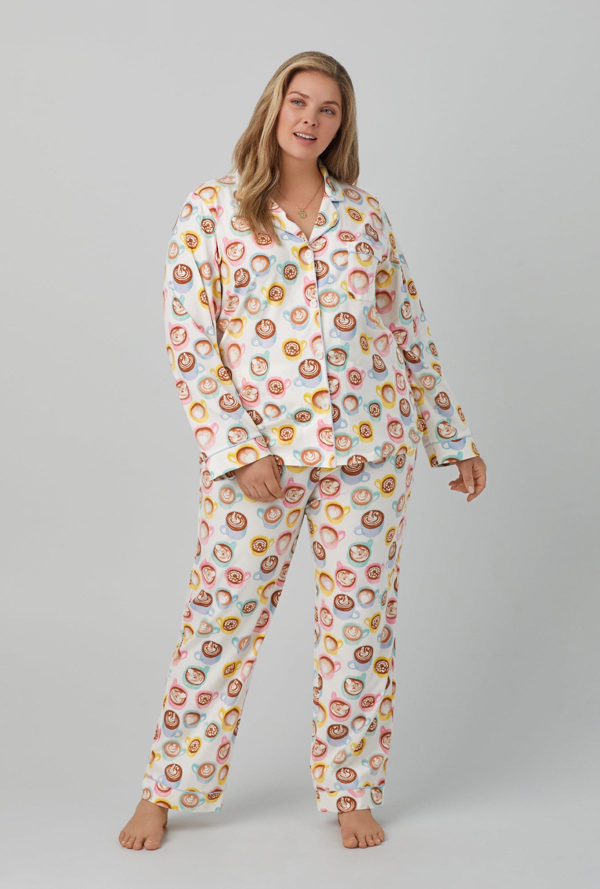 A lady wearing white long Sleeve Classic Stretch Jersey PJ Set with Lots of latte print
