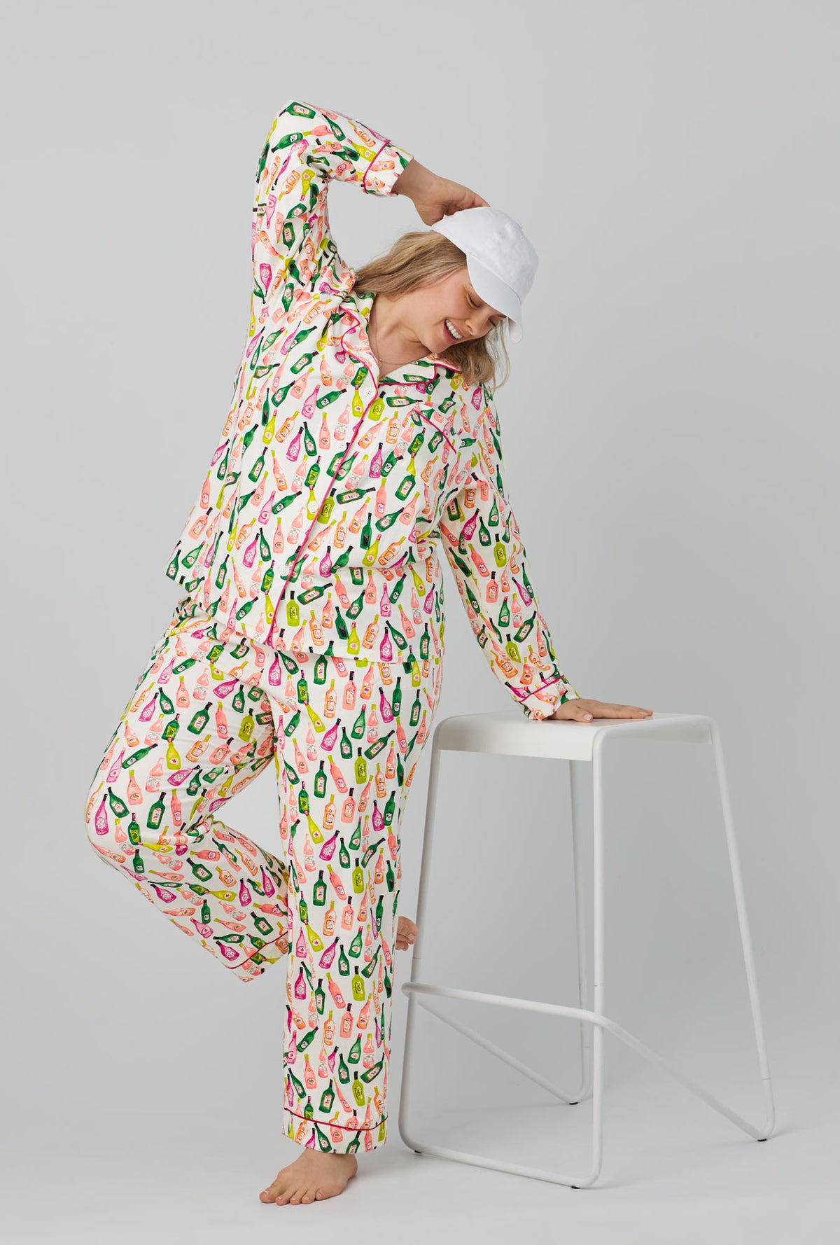 A lady wearing Long Sleeve Classic Stretch Jersey PJ Set with Wine List print