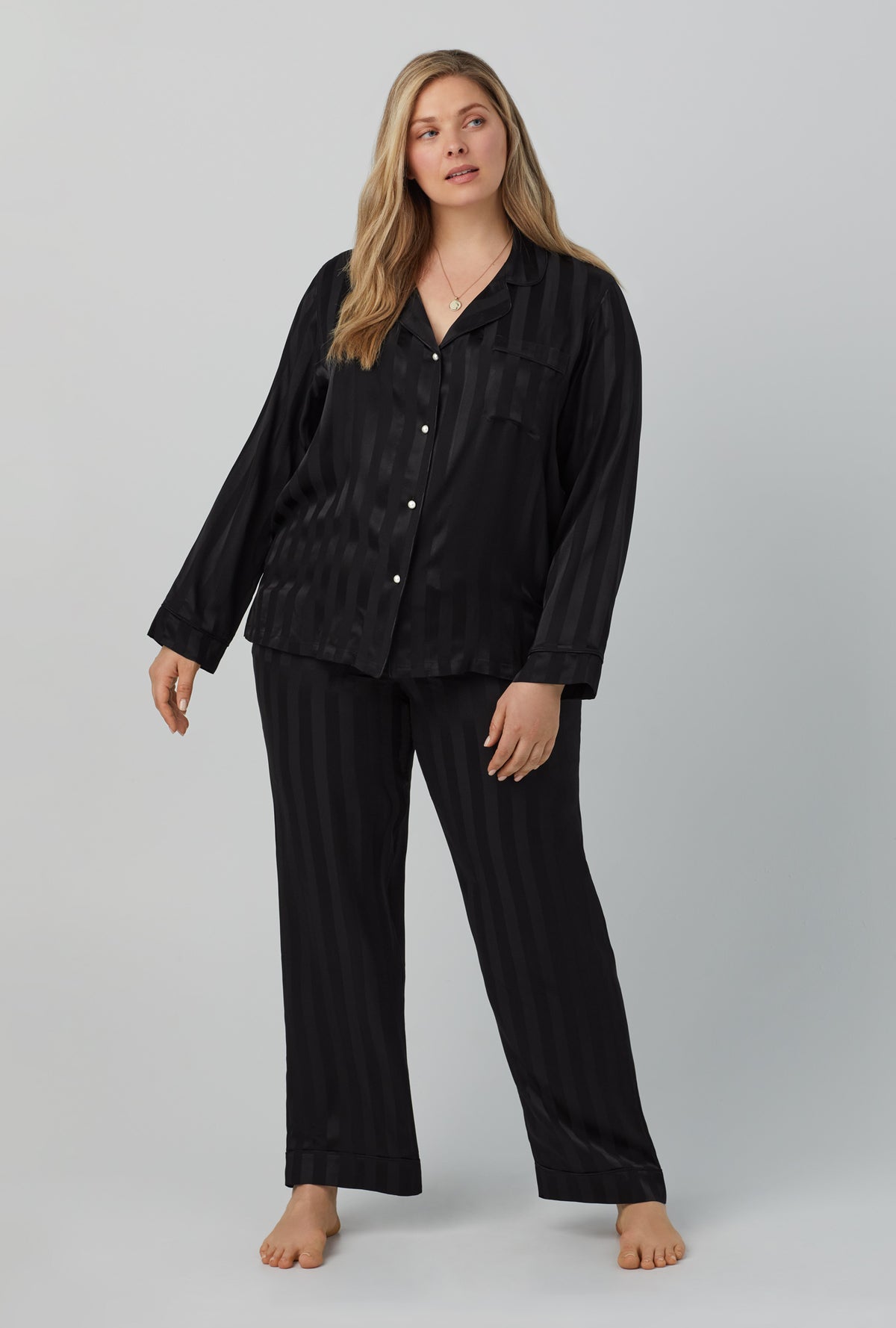 A lady wearing black  Long Sleeve Classic Washable Silk Satin PJ Set with Onyx print