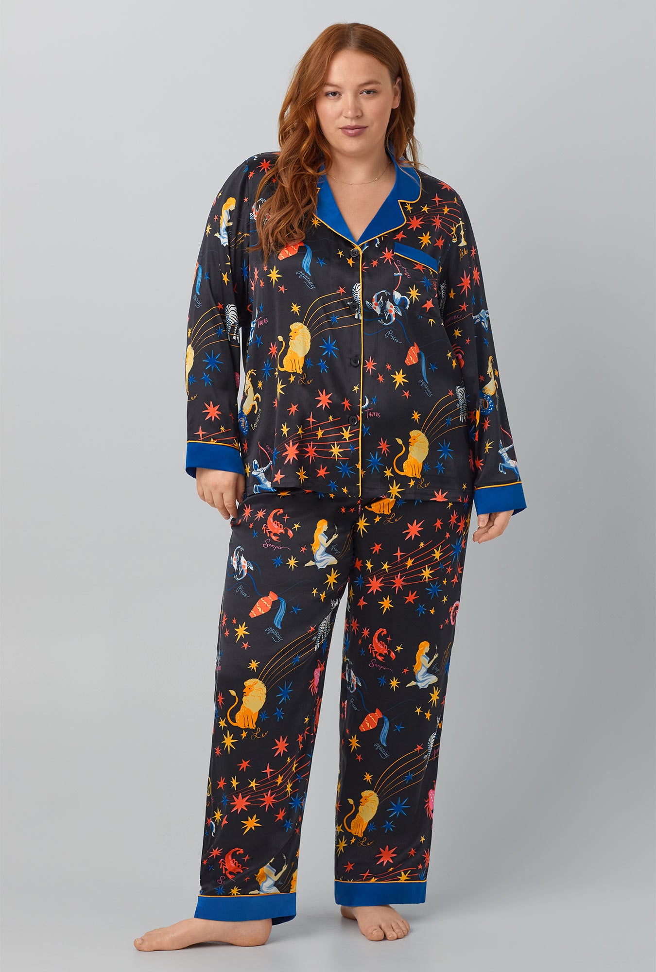 A lady wearing black Long Sleeve Classic Washable Silk PJ Set with Celestial Dreams print