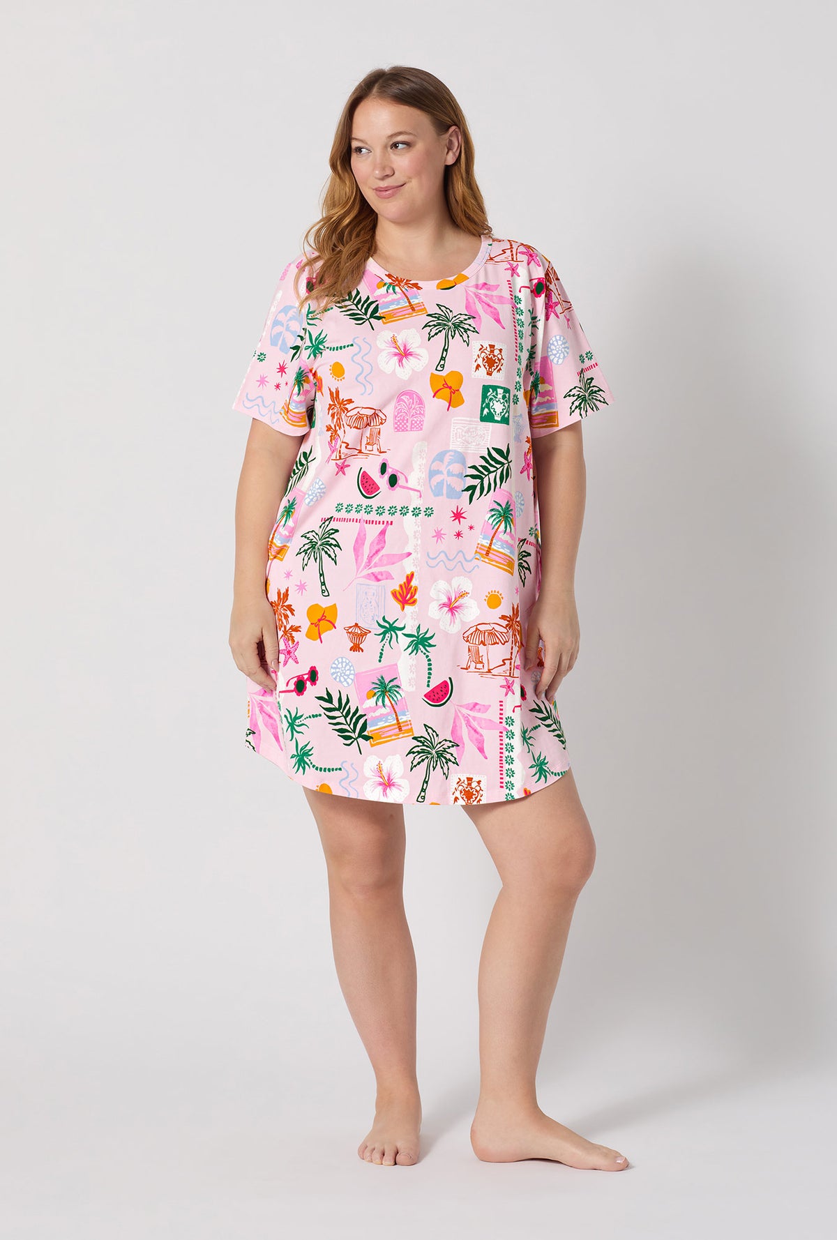 A Lady Wearing Plus Size Tropical Daydream Stretch Jersey T-shirt Sleep Dress posing with a front view look