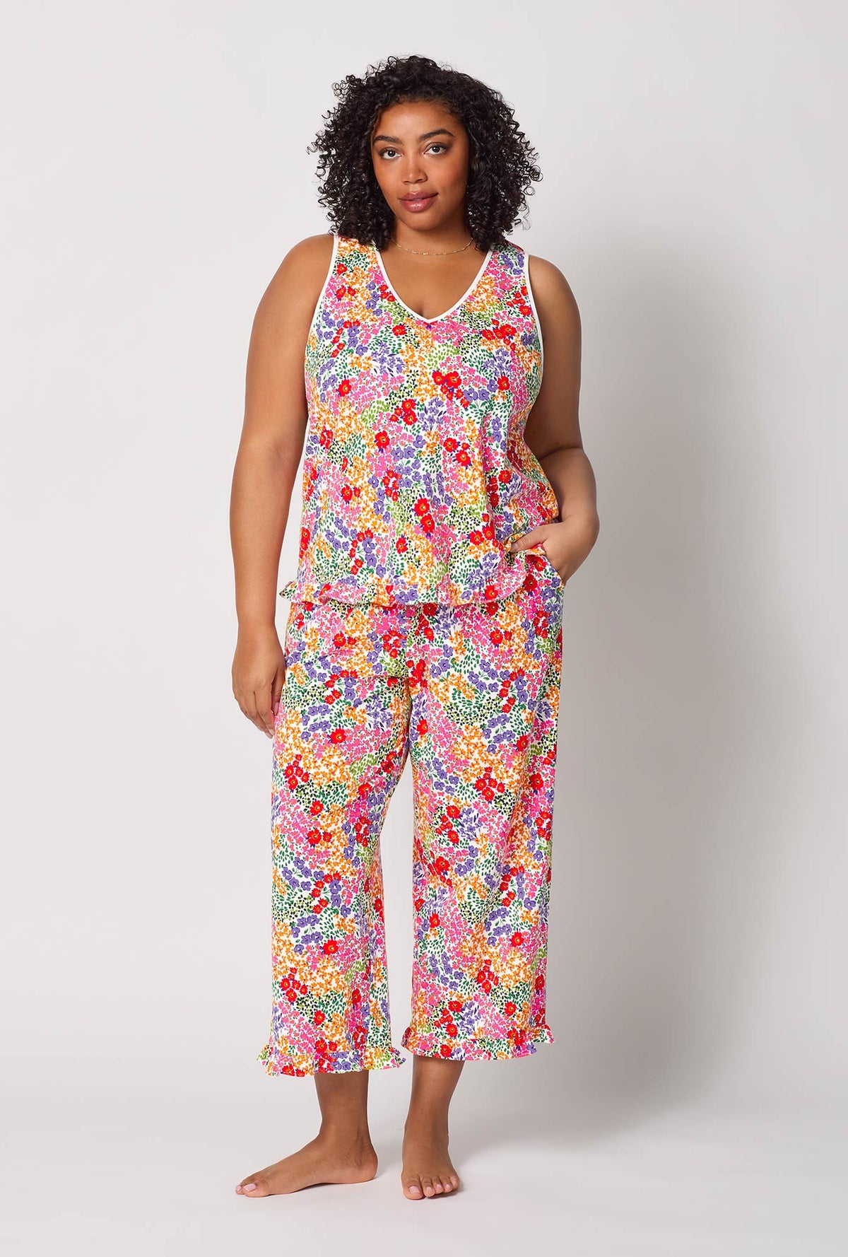 A lady wearing plus size Spring Fields Ruffle Tank Stretch Jersey Cropped Pj Set