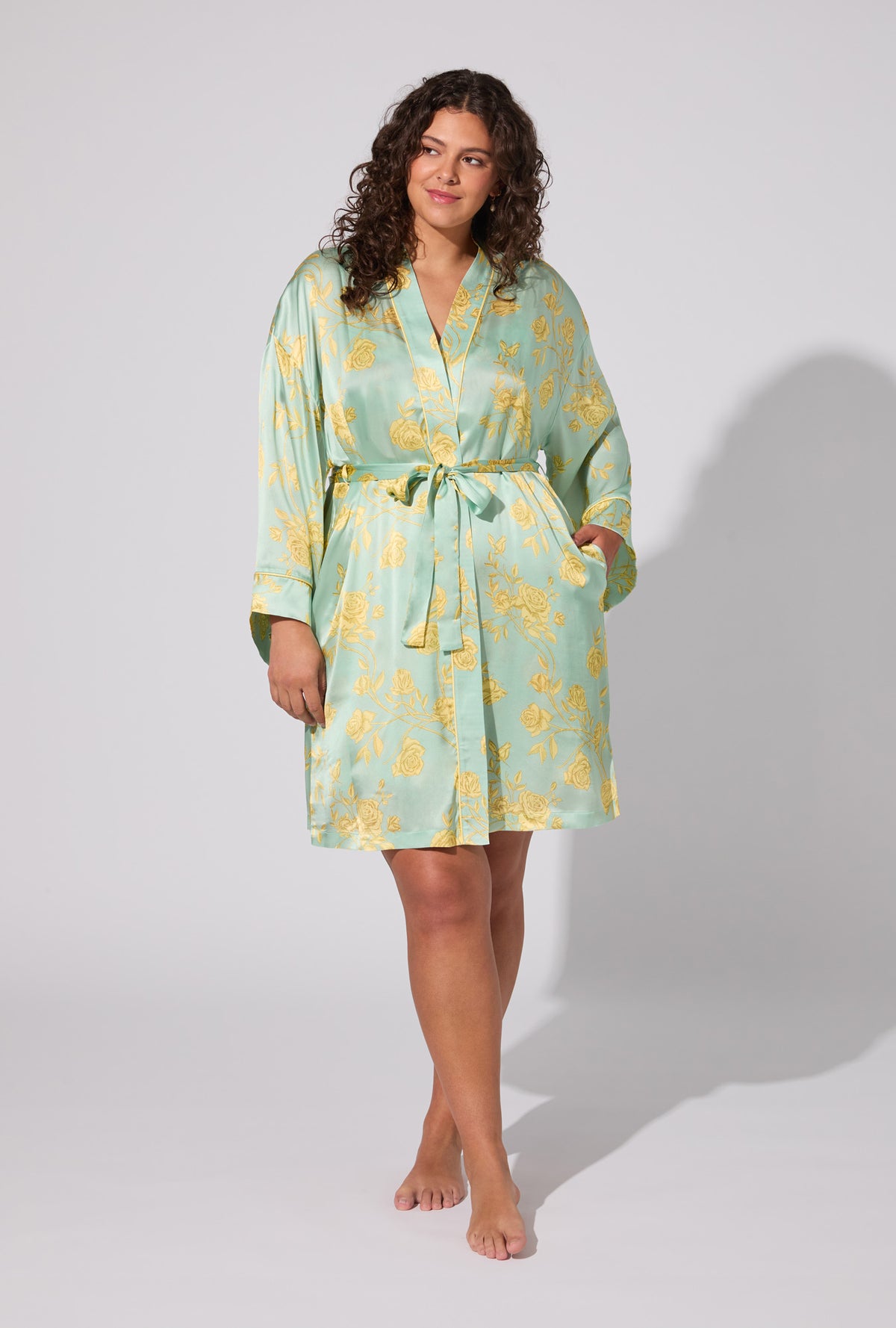 A lady wearing Royal Roses Woven Washable Silk Satin Robe