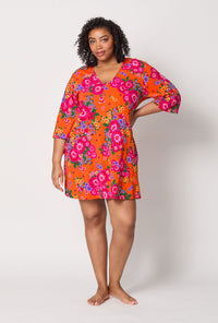 A lady wearing plus size Orange Stretch Jersey Sleep Dress front view