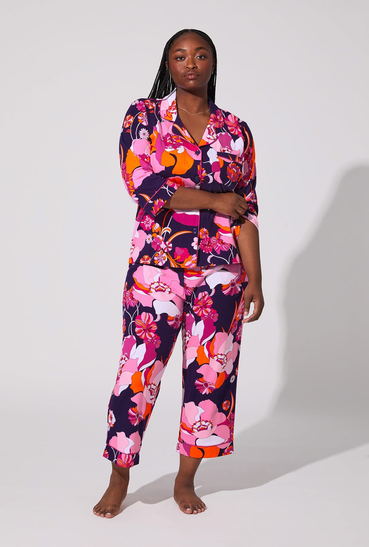 A lady wearing BedHead X Trina Turk Floral Medley 3/4 Sleeve Classic Stretch Jersey Cropped PJ Set