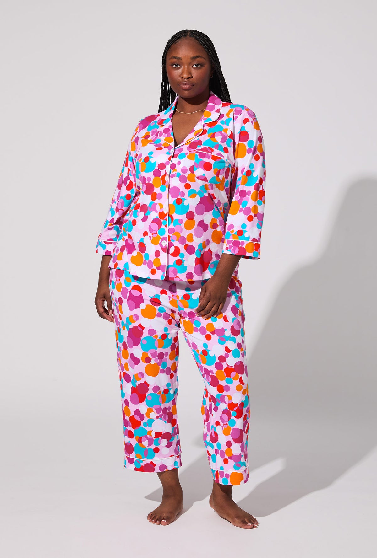 A lady wearing BedHead X Trina Turk Bubble Dots 3/4 Sleeve Classic Stretch Jersey Cropped PJ Set