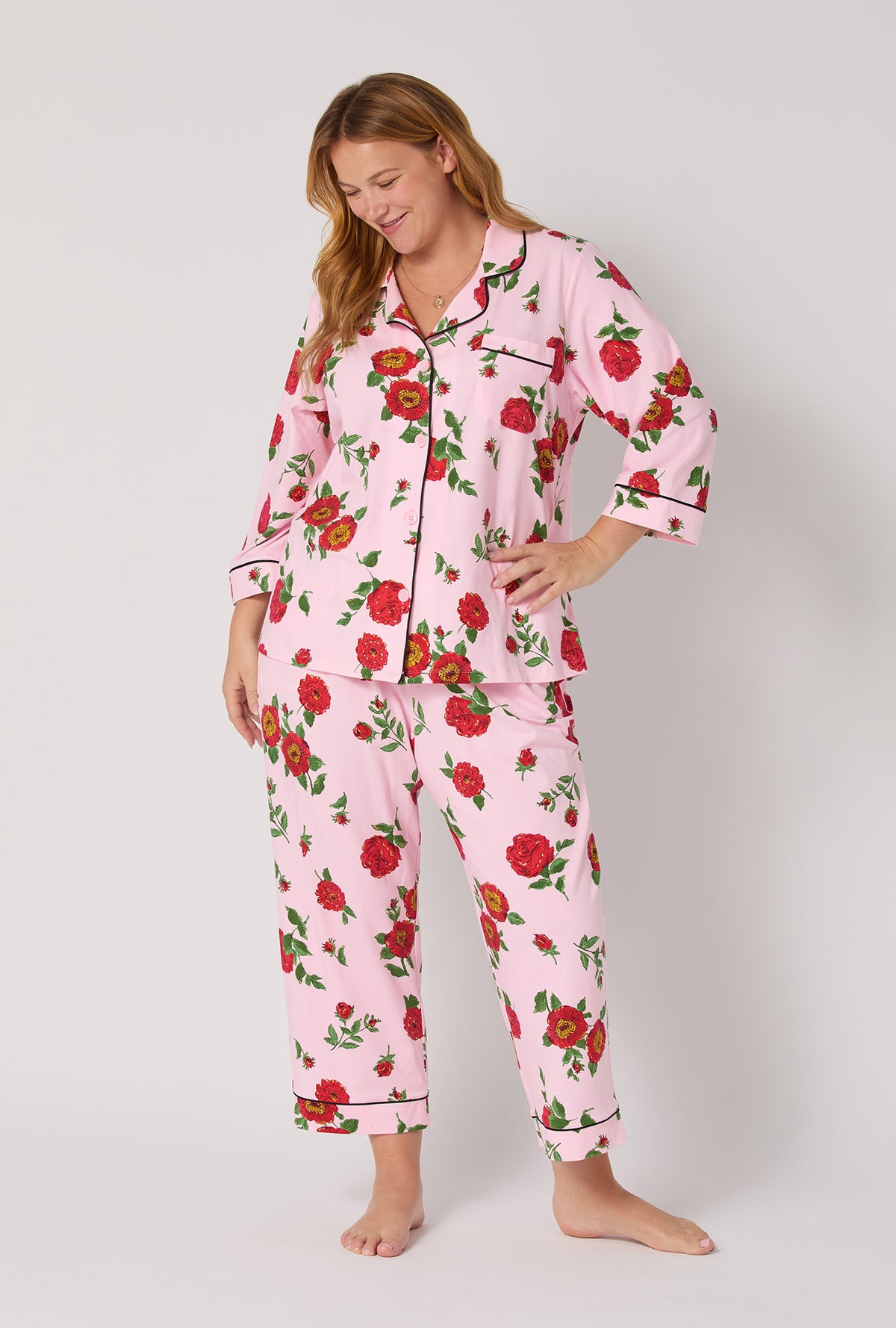 A lady wearing Falling Blooms 3/4 Sleeve Classic Stretch Jersey Cropped Pj Set