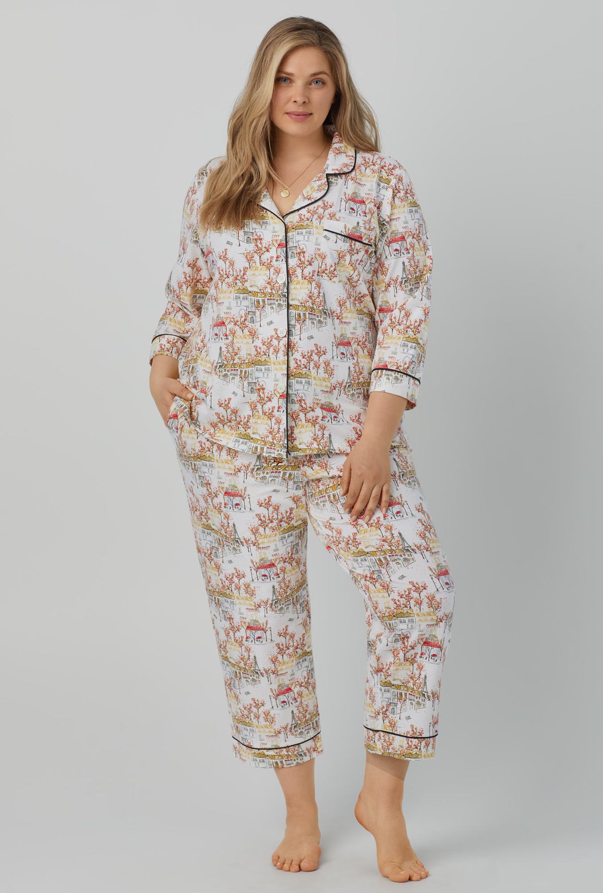 A lady wearing 3/4 Sleeve Classic Stretch Jersey Cropped PJ Set with Fall in Paris print