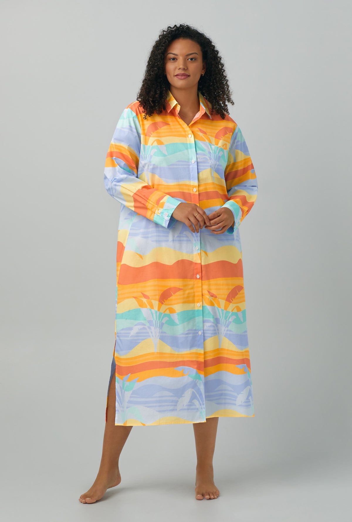 A lady wearing plus size multi color  Long Sleeve Maxi Collared Woven Cotton Poplin Sleepshirt with Desert Palms print