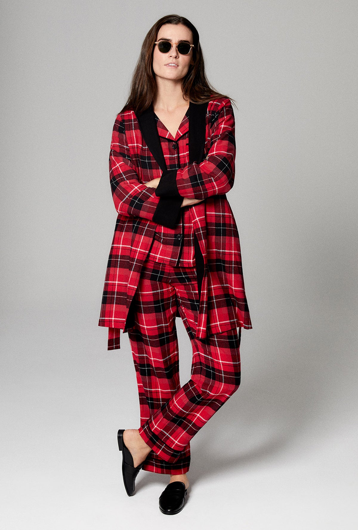 A lady wearing red long sleeve french terry woven cotton flannel robe with nicholas plaid print.
