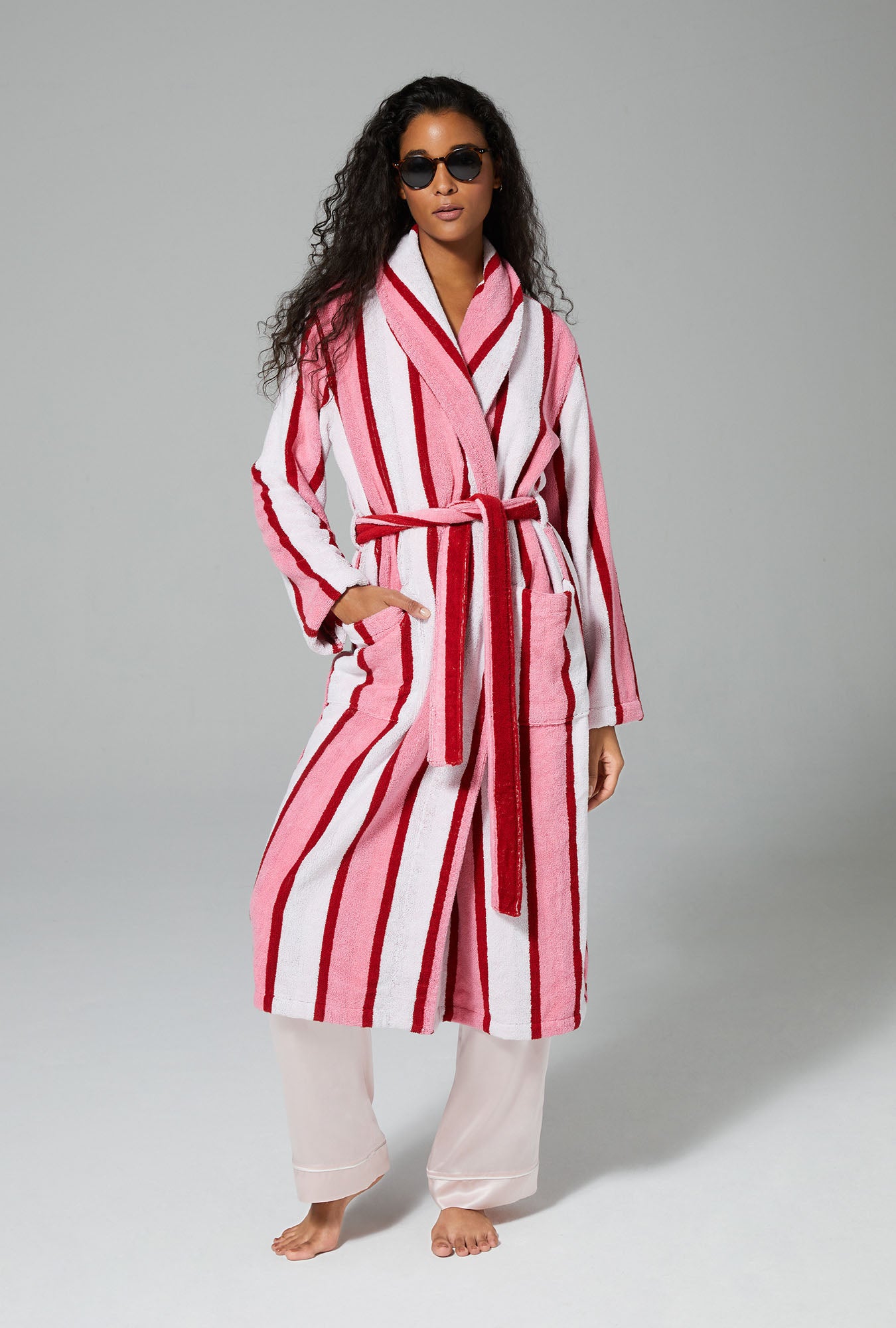 A lady wearing Cottage Stripe Unisex Long Woven Cotton Loop Turkish Terry Jacquard Robe