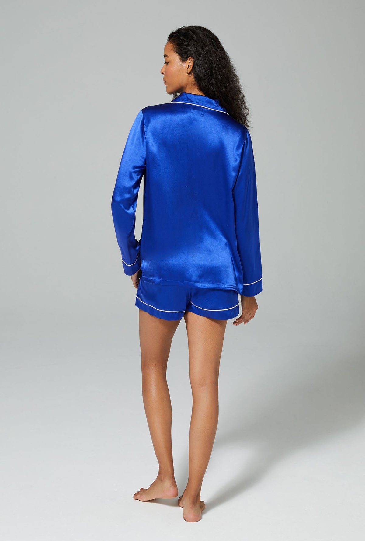 A lady wearing blue long sleeve classic shorty pj set