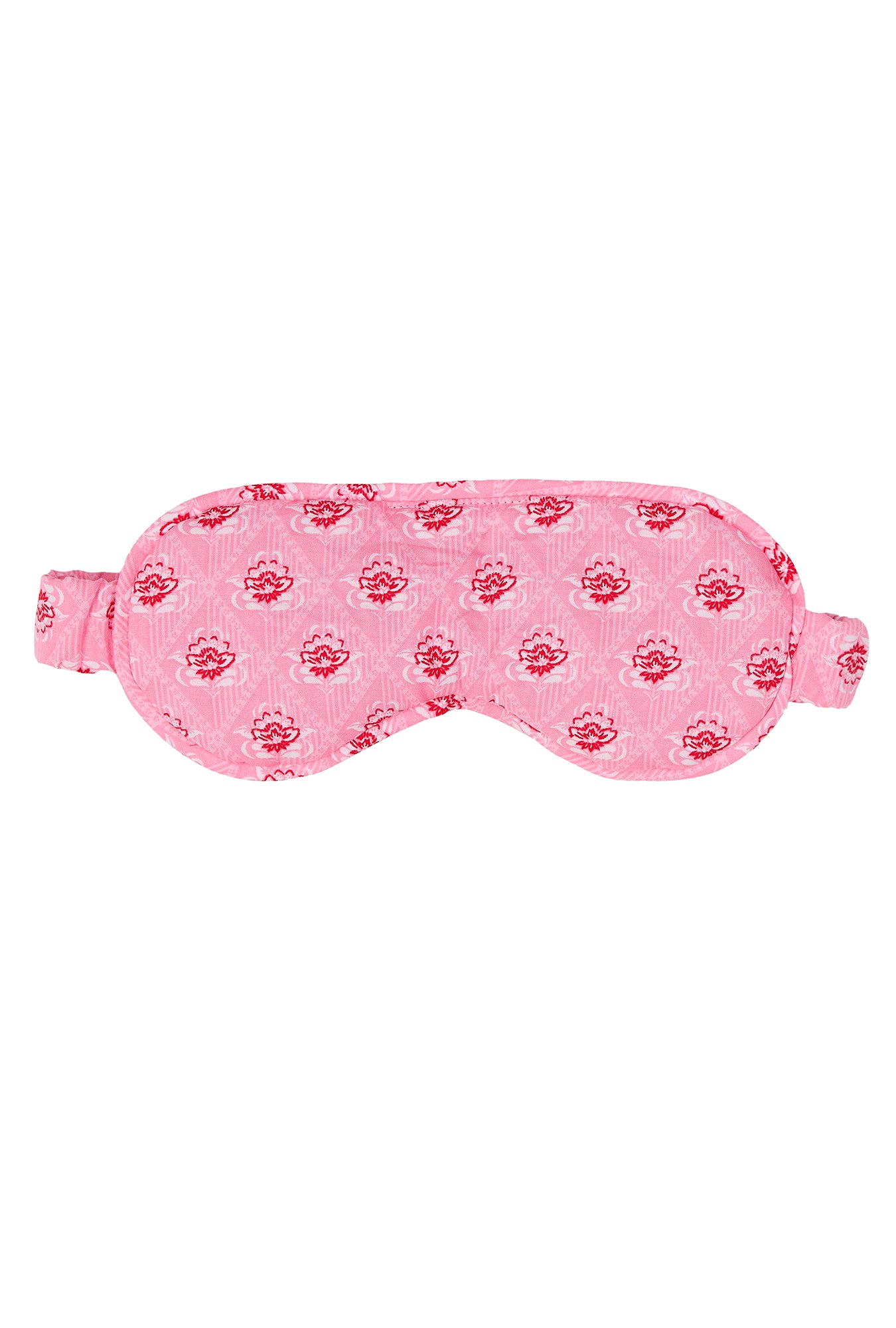 A lady wearing pink sleep mask with corsage print