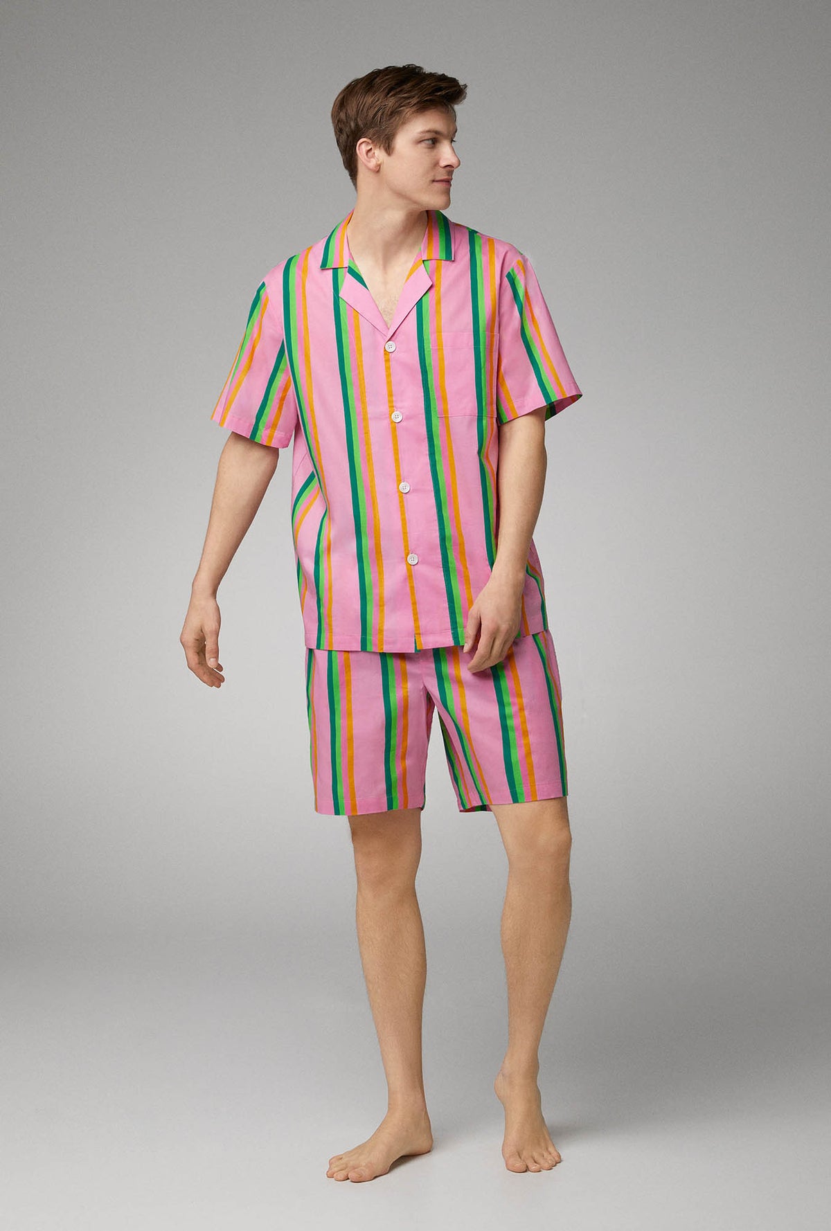 A men wearing Short Sleeve Woven Poplin Boxer PJ Set with  Pineapple Stripe print