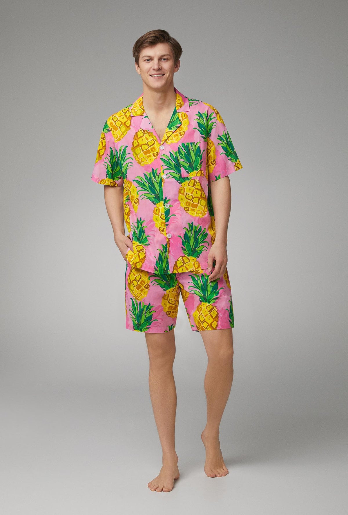 A men wearing Men&#39;s Short Sleeve Woven Poplin Boxer PJ Set with  Pineapple print
