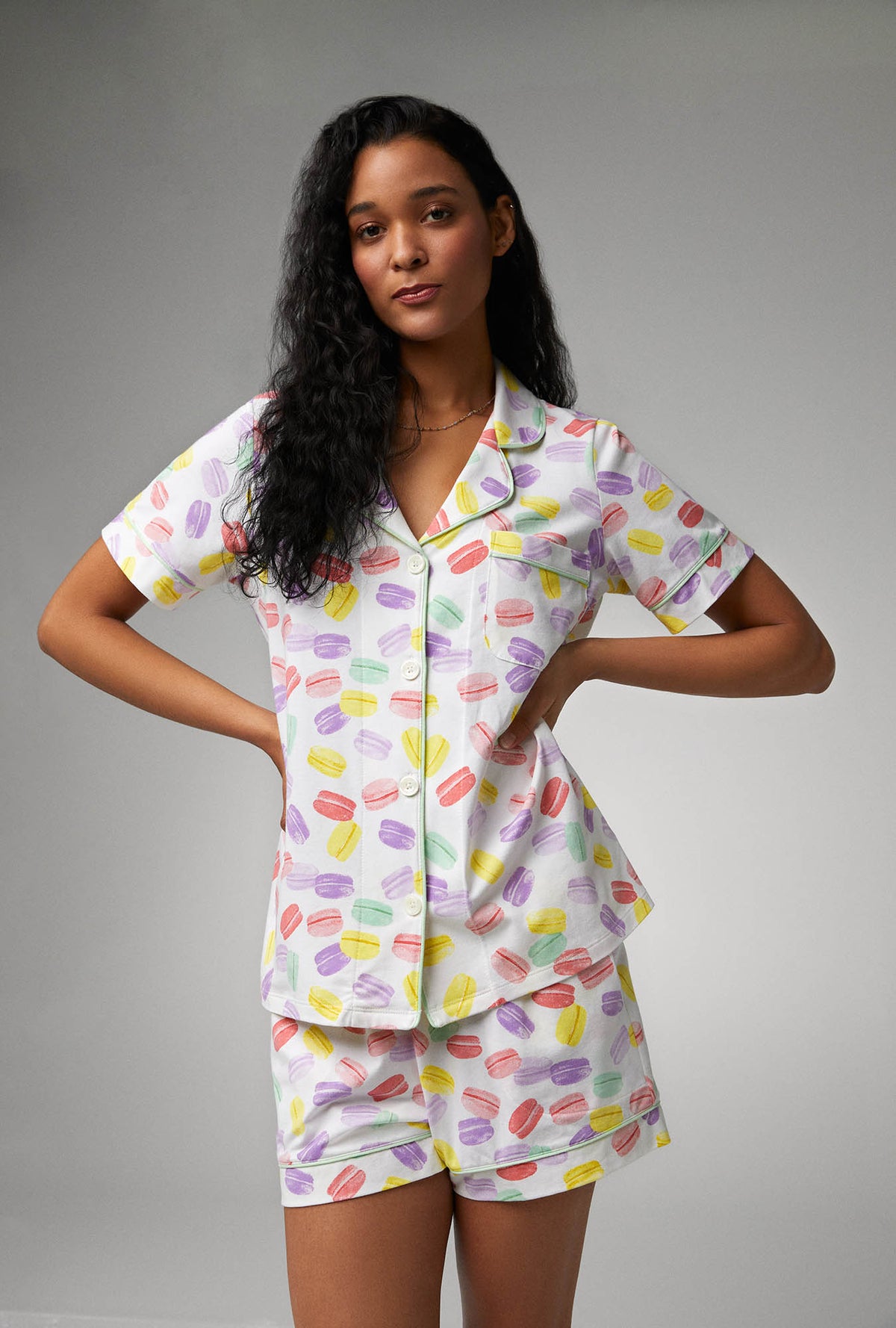 A lady wearing white Short Sleeve Classic Shorty Stretch Jersey PJ Set with Delice De Macarons print
