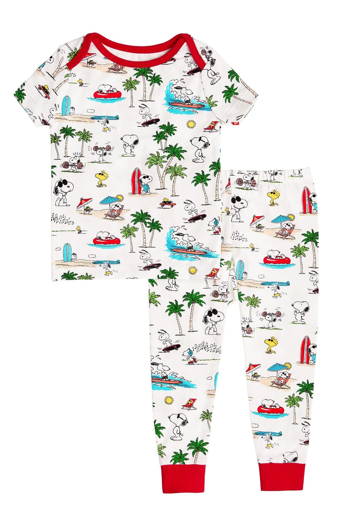 A baby wearing a white short sleeve shorty pj set with snoopy venice beach pattern.