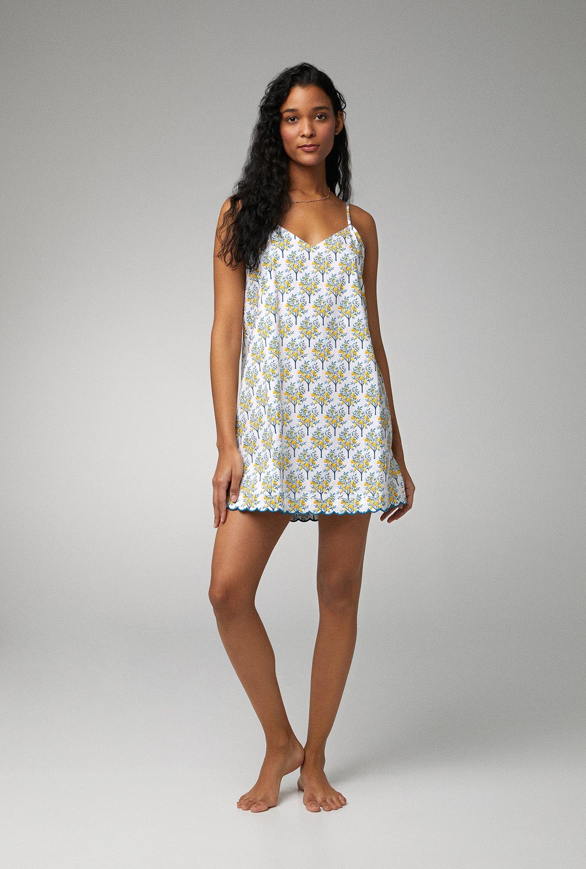 A lady wearing Woven Cotton Poplin Scallop Chemise with Lemon Trees  print