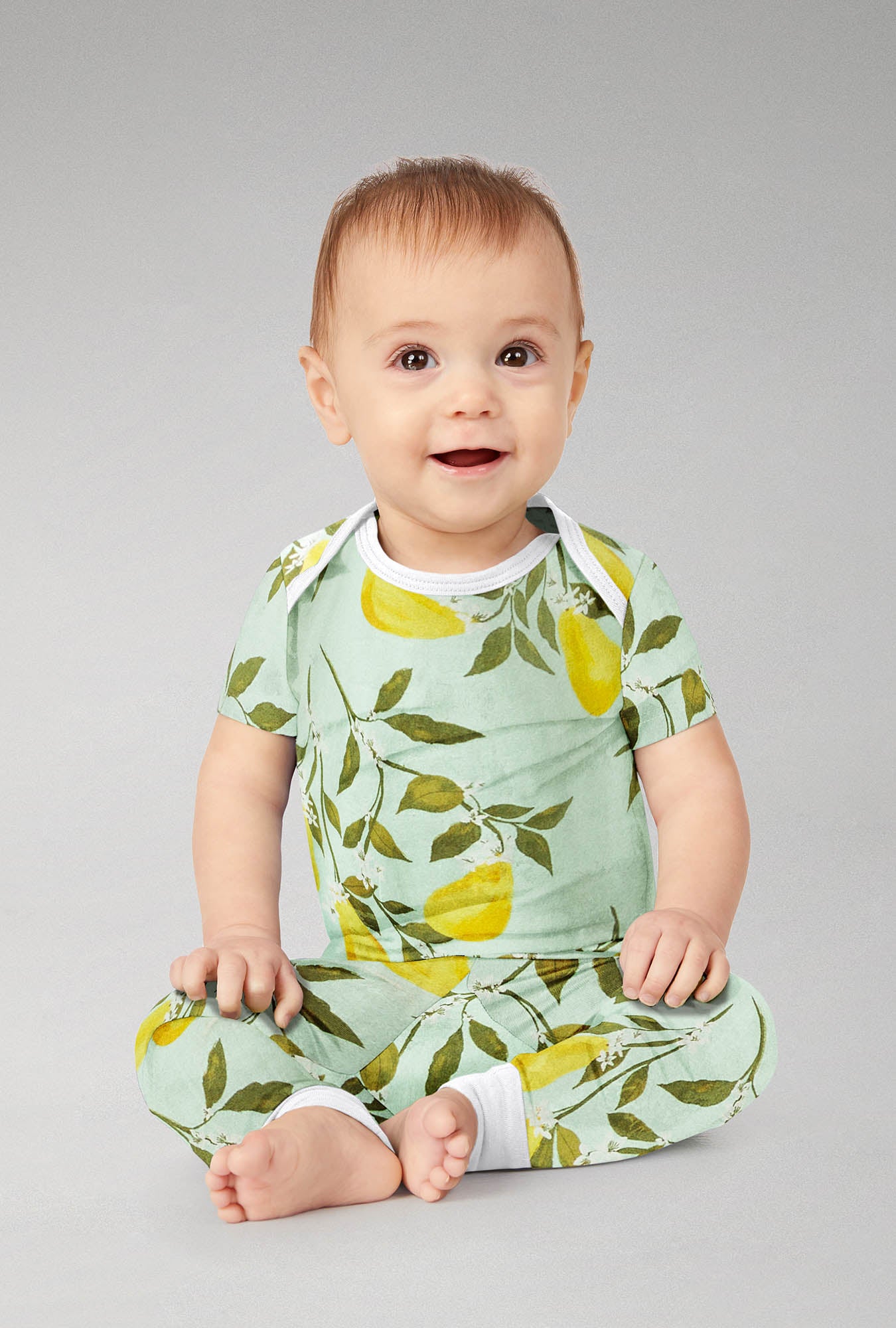 A baby wearing Short Sleeve Stretch Jersey Boo Boo PJ Set with  Pear Tree print