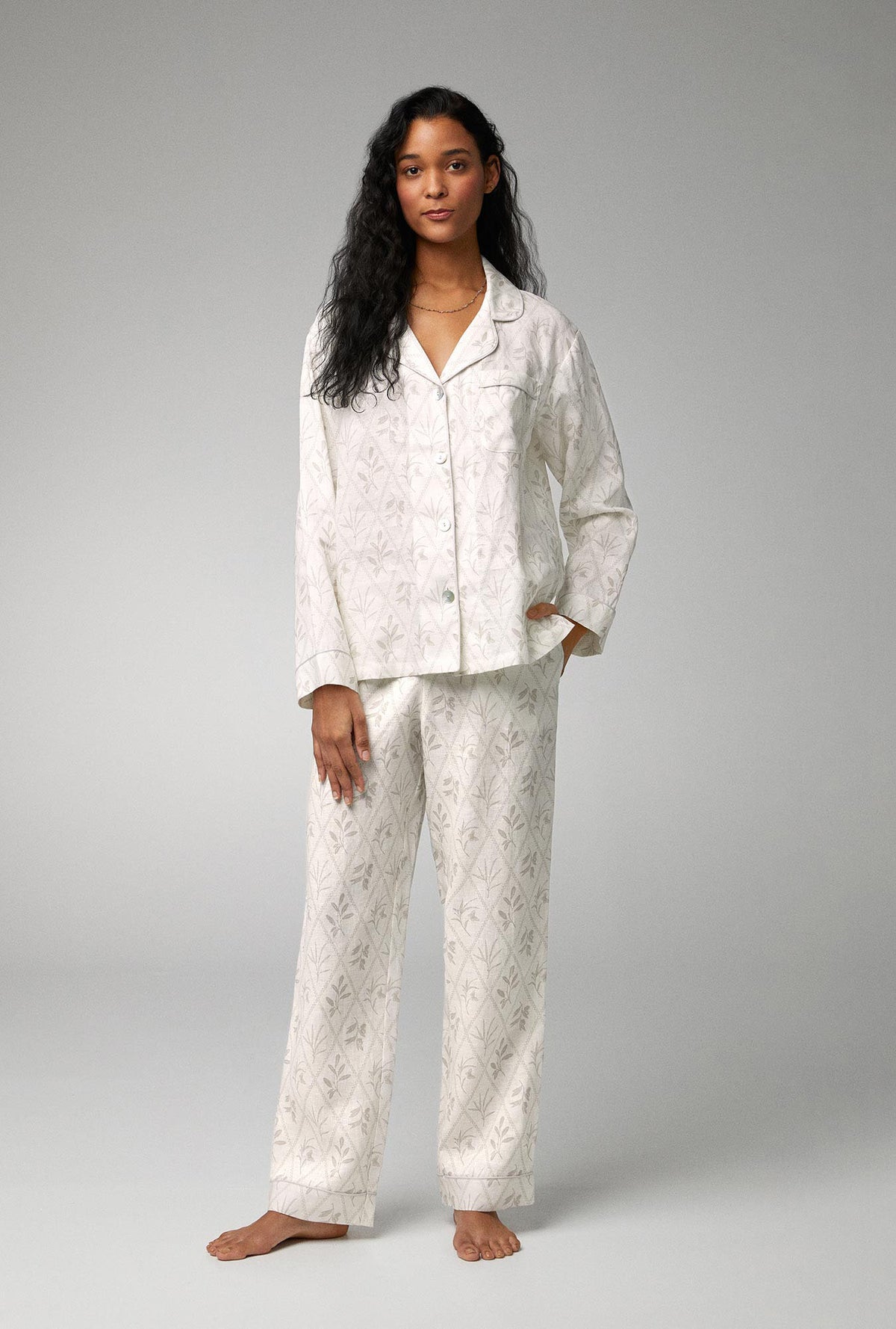A lady wearing Long Sleeve Classic Woven Linen PJ Set with Botanical Studies print