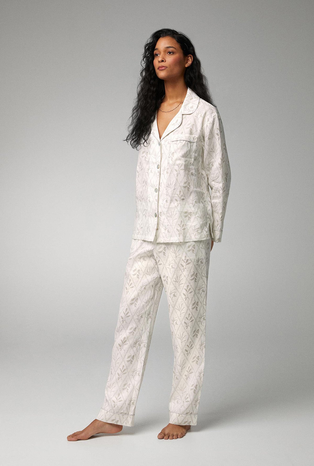 A lady wearing Long Sleeve Classic Woven Linen PJ Set with Botanical Studies print