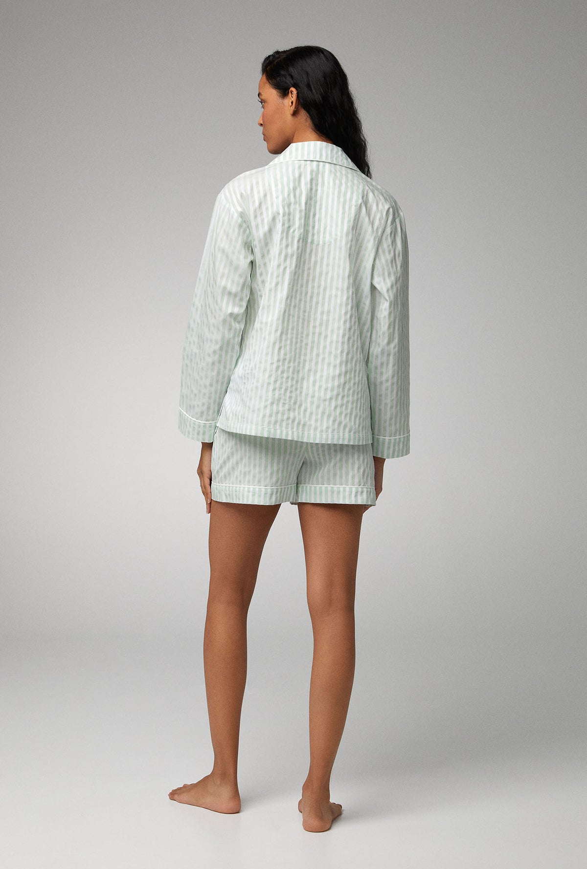 A lady wearing Long Sleeve Classic Woven Cotton Sateen Shorty PJ Set with Mint 3D Stripe print