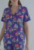 A lady wearing blue short sleeve classic stretch jersey cropped pj set with co sail away print.