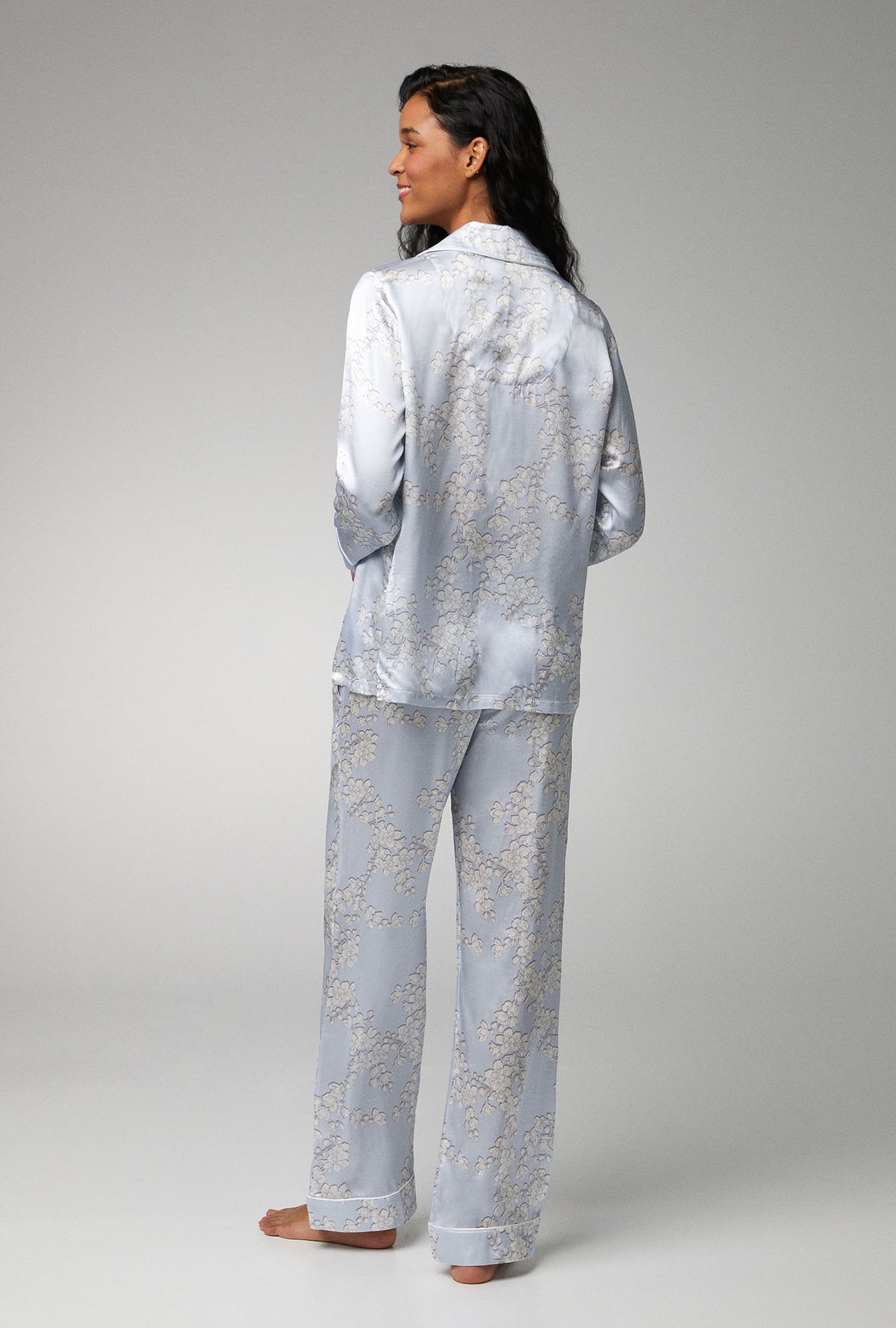 A lady wearing Long Sleeve Classic Woven Silk Satin PJ Set with Renee&#39;s Blossom print