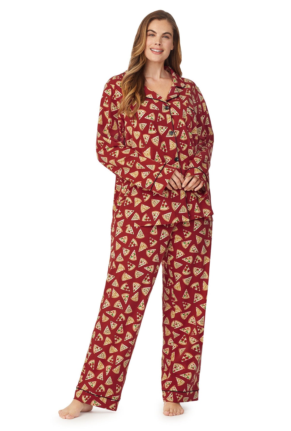 A lady wearing a brown long sleeve plus size pj set with pizza pattern.