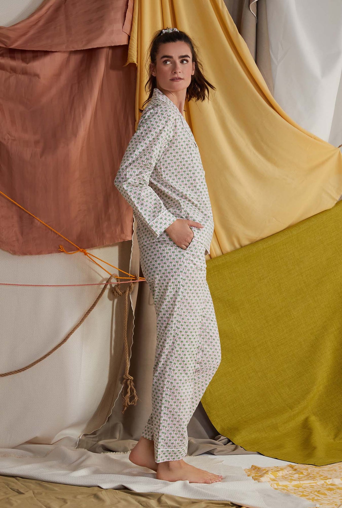 A lady wearing multicolor long sleeve clasic woven cotton poplin pj set with palm geo print.