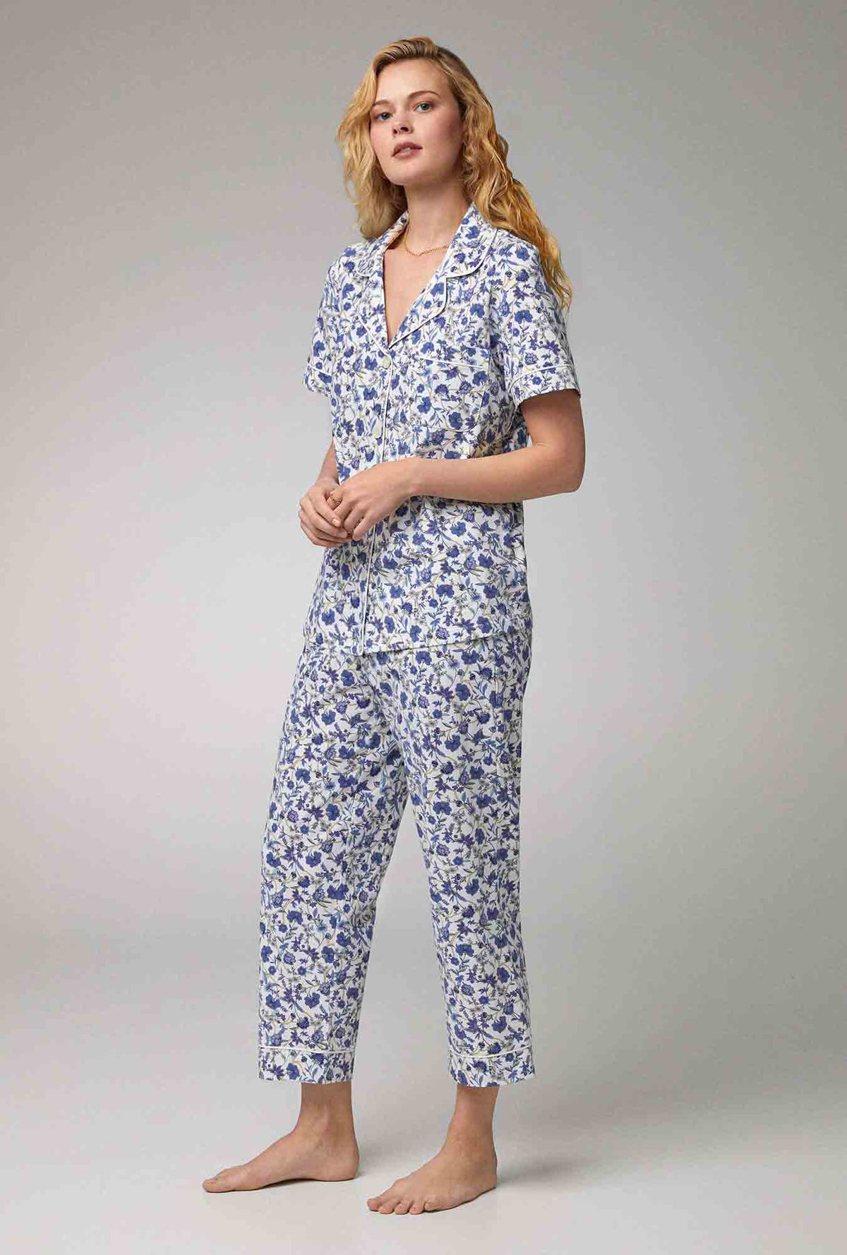 A lady wearing Short Sleeve Classic Stretch Jersey Cropped PJ Set with Terrance Floral print
